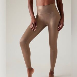 LEGGINGS - Women’s Athleta Elation Shine Tights In Pyrite Shine. Size M.
